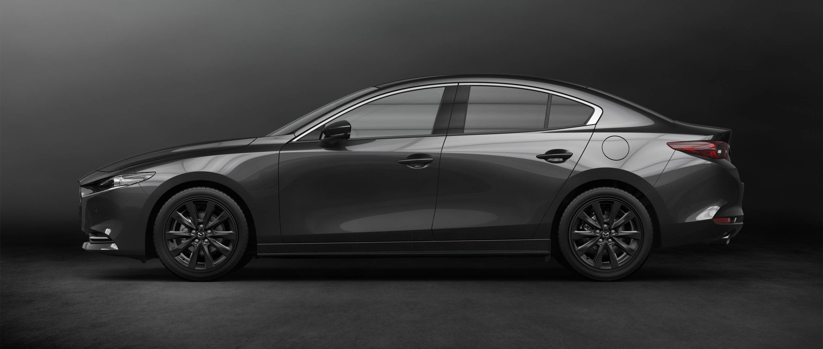 Mazda 3 sedan lateral | Memo Lira