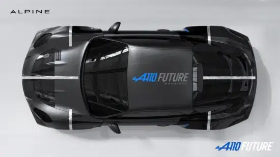 Top-down view of a black Alpine A110 Future concept car with white racing stripes and blue A110 Future branding on the hood; Alpine logo in the top-left.